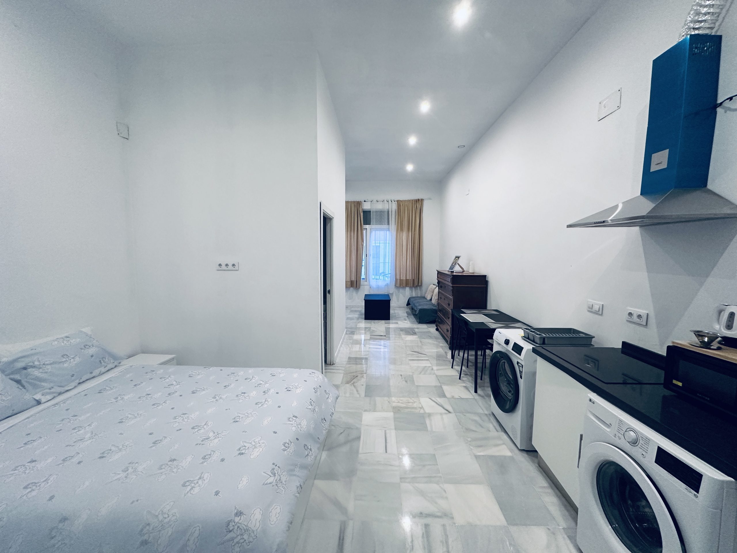 Vista general del Apartamento 3 de Lofts Escala con zona de estancia